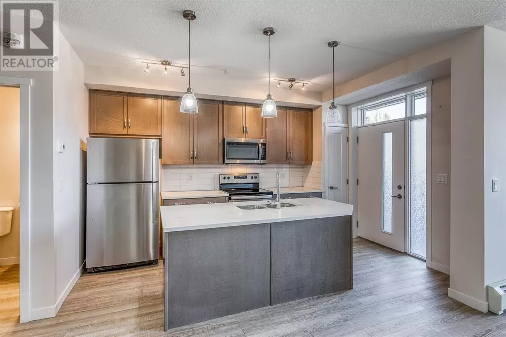 Apartment for rent: 12, 30 Shawnee Common Sw, Calgary, Alberta T2Y 0R1