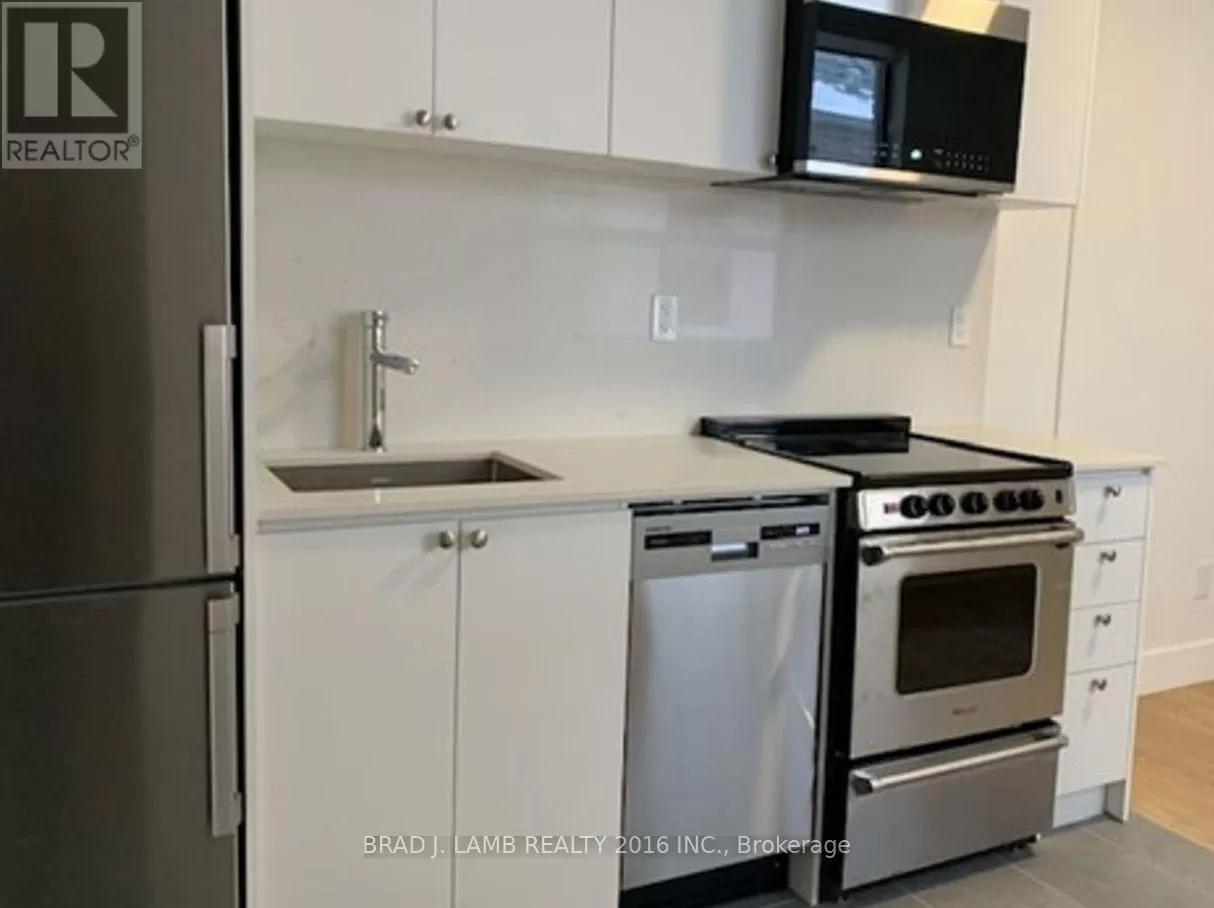 Row / Townhouse for rent: 203 - 28 Maynard Avenue W, Toronto, Ontario M6K 2Z9