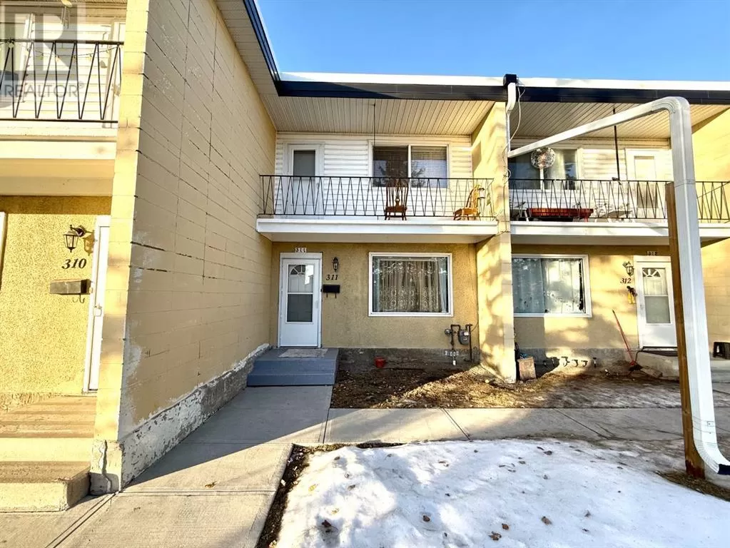 Row / Townhouse for rent: 311, 2211 19 Street Ne, Calgary, Alberta T2E 4Y5