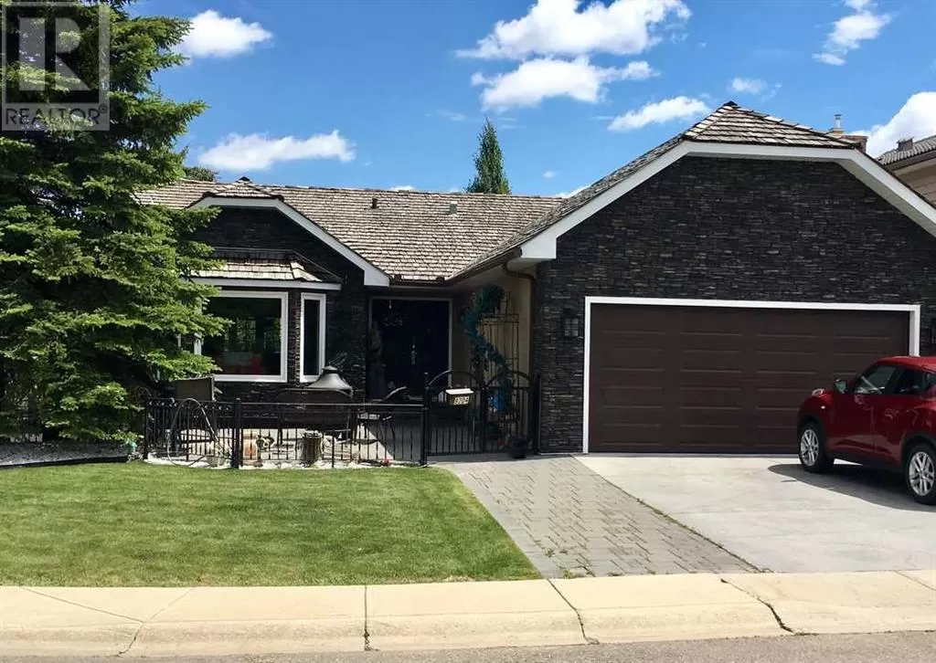 House for rent: 9204 Oakmount Drive Sw, Calgary, Alberta T2V 4X9